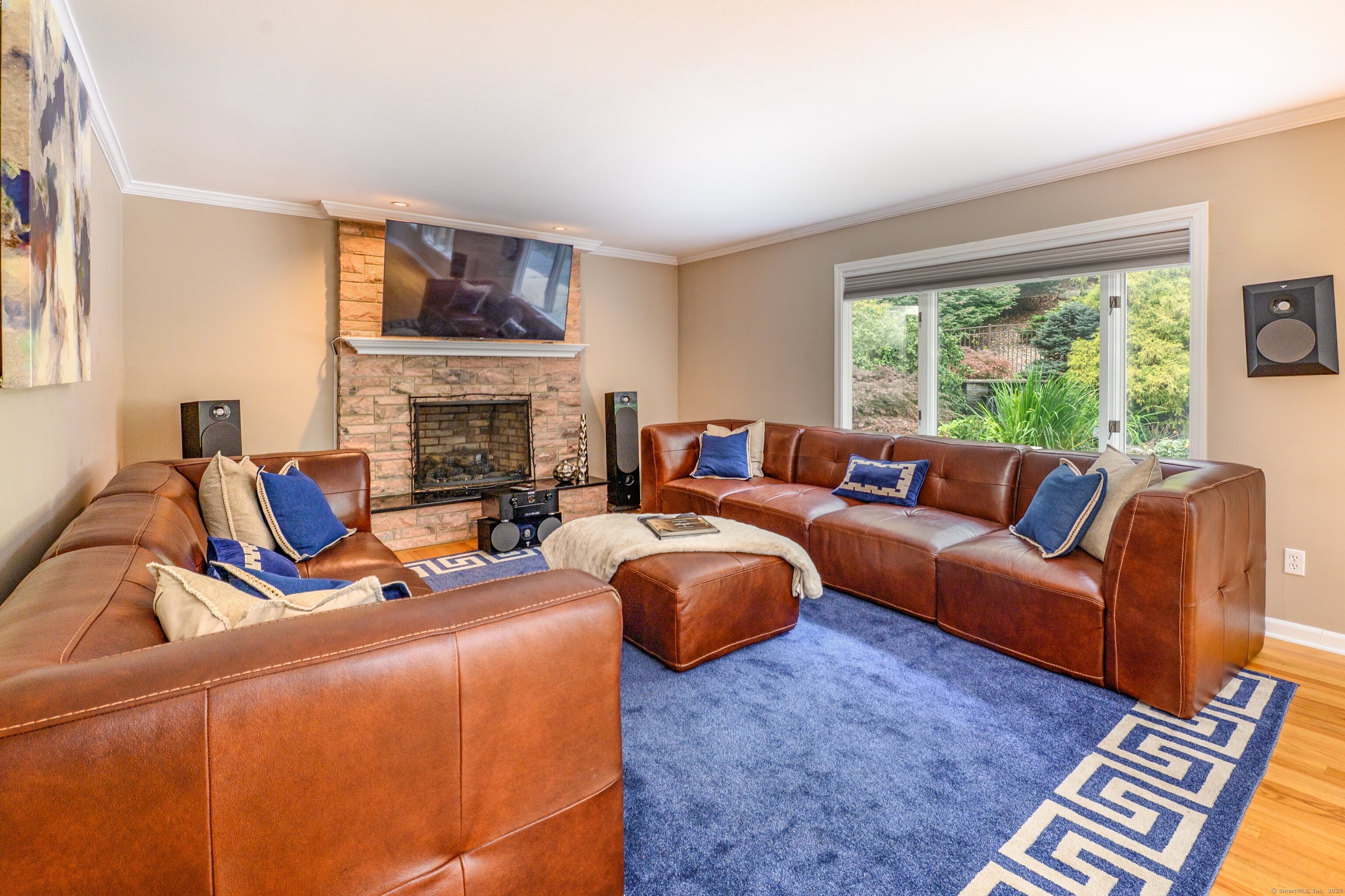 85 Inverness Court Cheshire, CT 06410 - Photo 15 of 40 a living room with furniture fireplace and a large window
