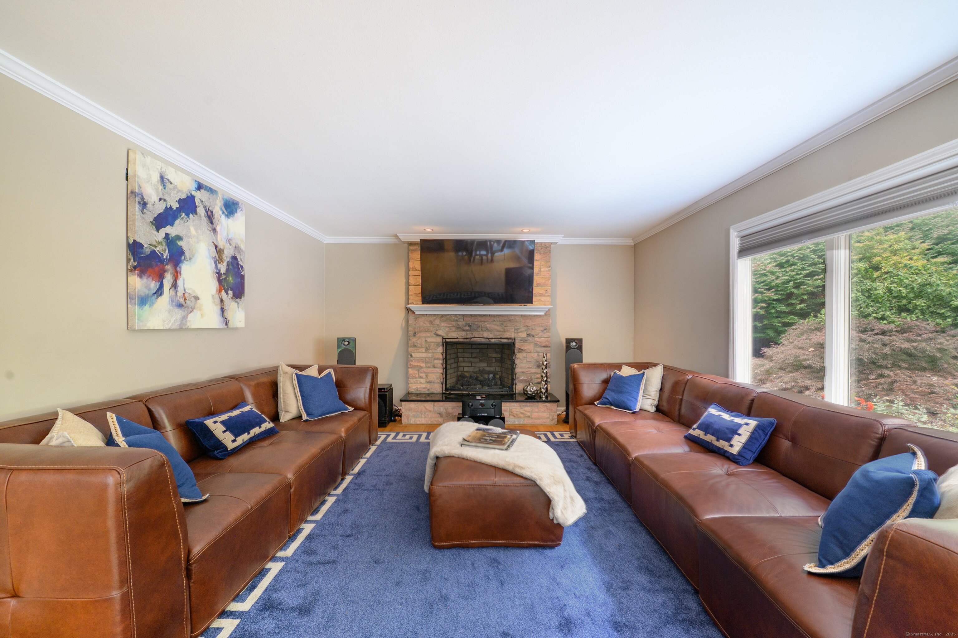85 Inverness Court Cheshire, CT 06410 - Photo 16 of 40 a living room with furniture fireplace and a large window