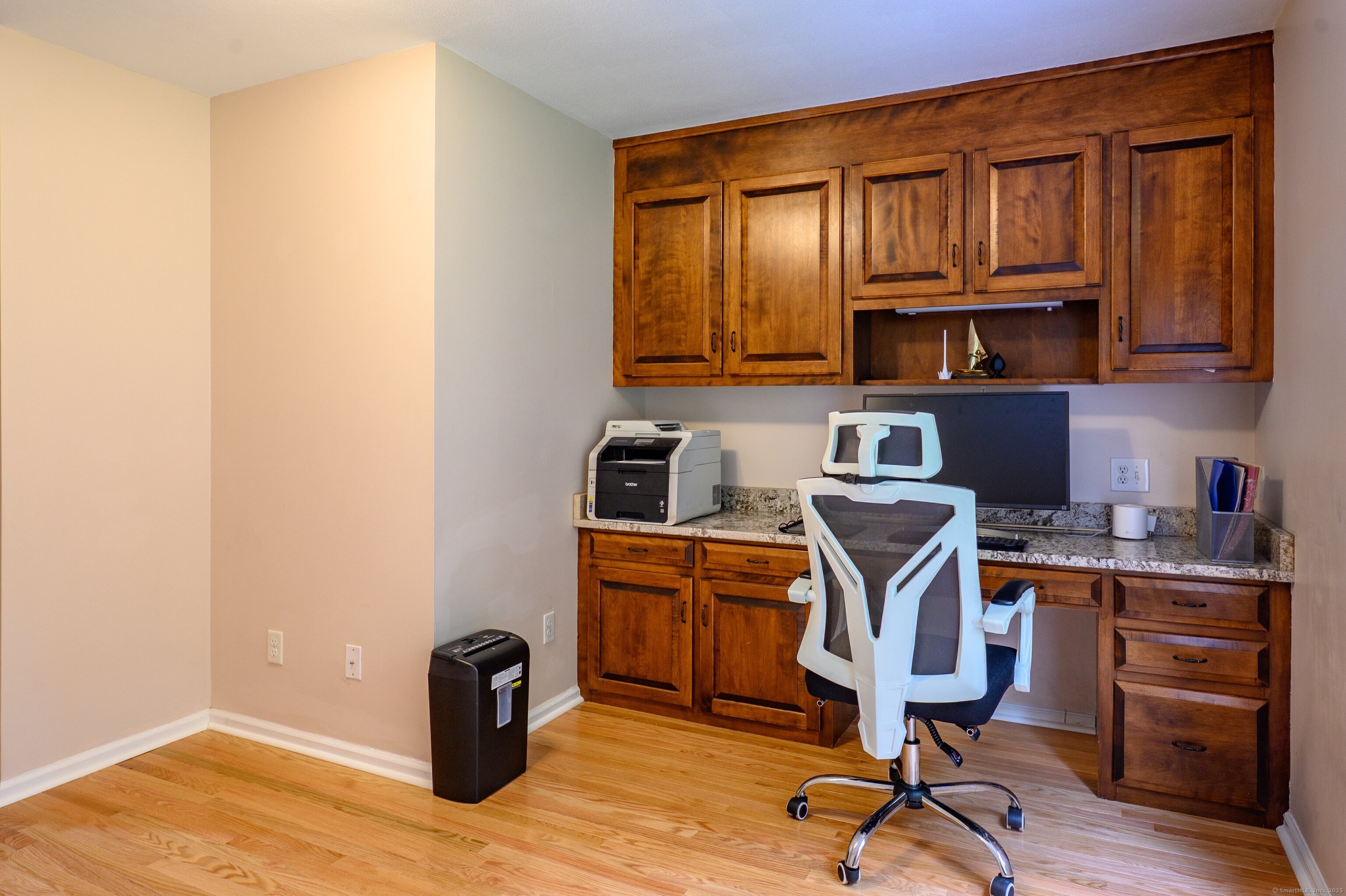 85 Inverness Court Cheshire, CT 06410 - Photo 17 of 40 a view of a workspace with furniture and a window