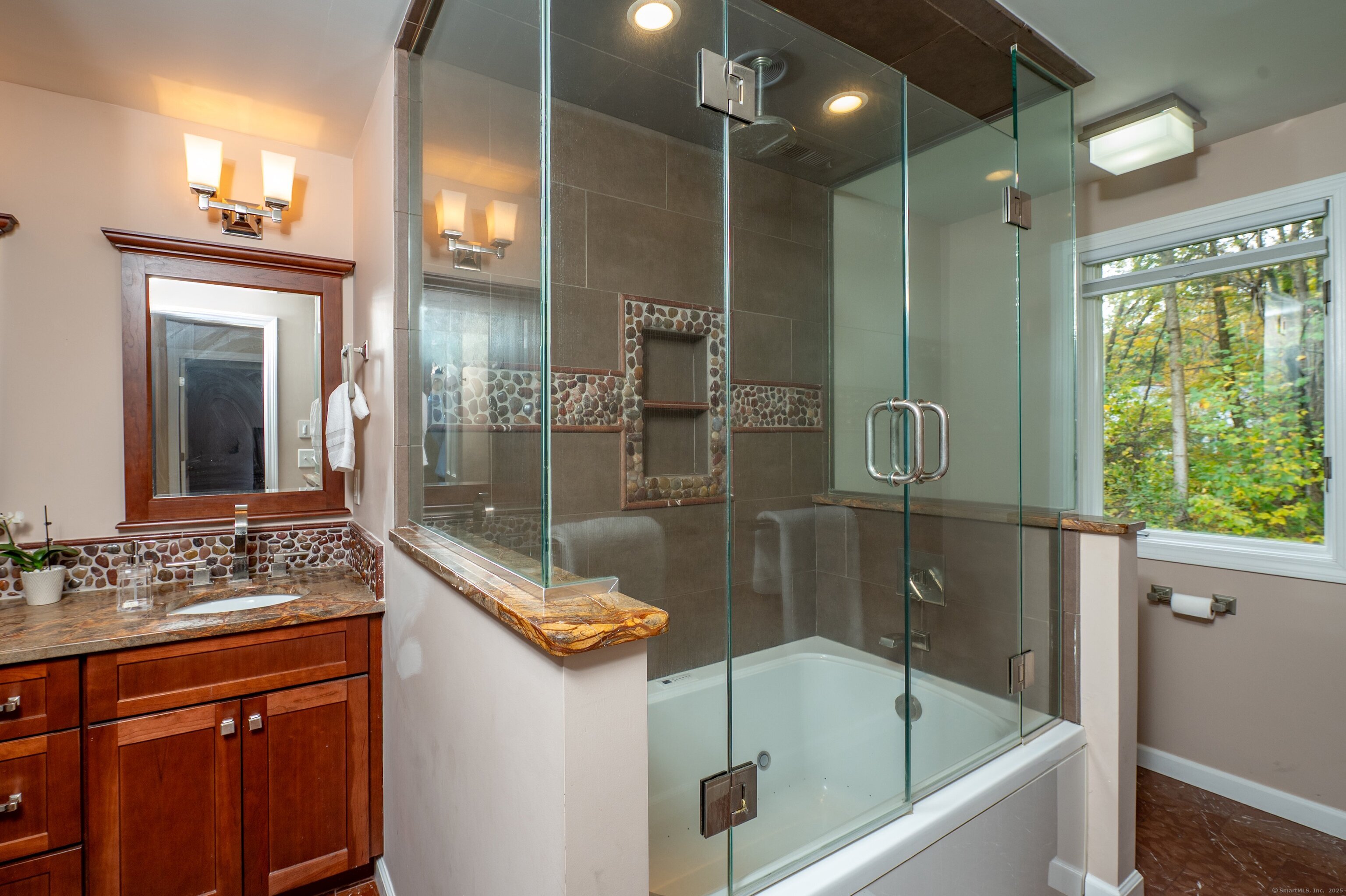 85 Inverness Court Cheshire, CT 06410 - Photo 28 of 40 a bathroom with a bathtub and a sink