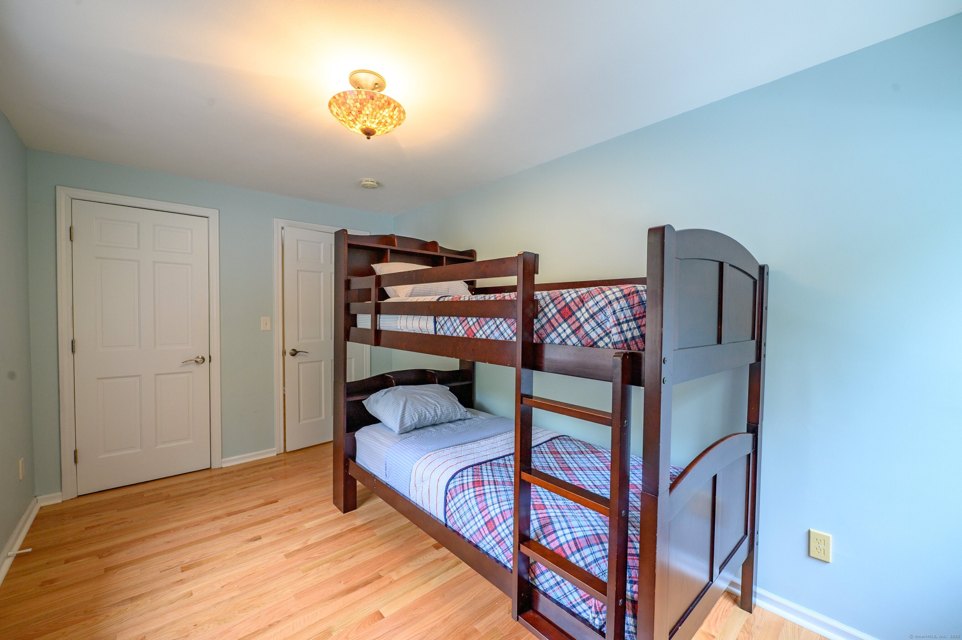 85 Inverness Court Cheshire, CT 06410 - Photo 30 of 40 a bedroom with furniture and a rug