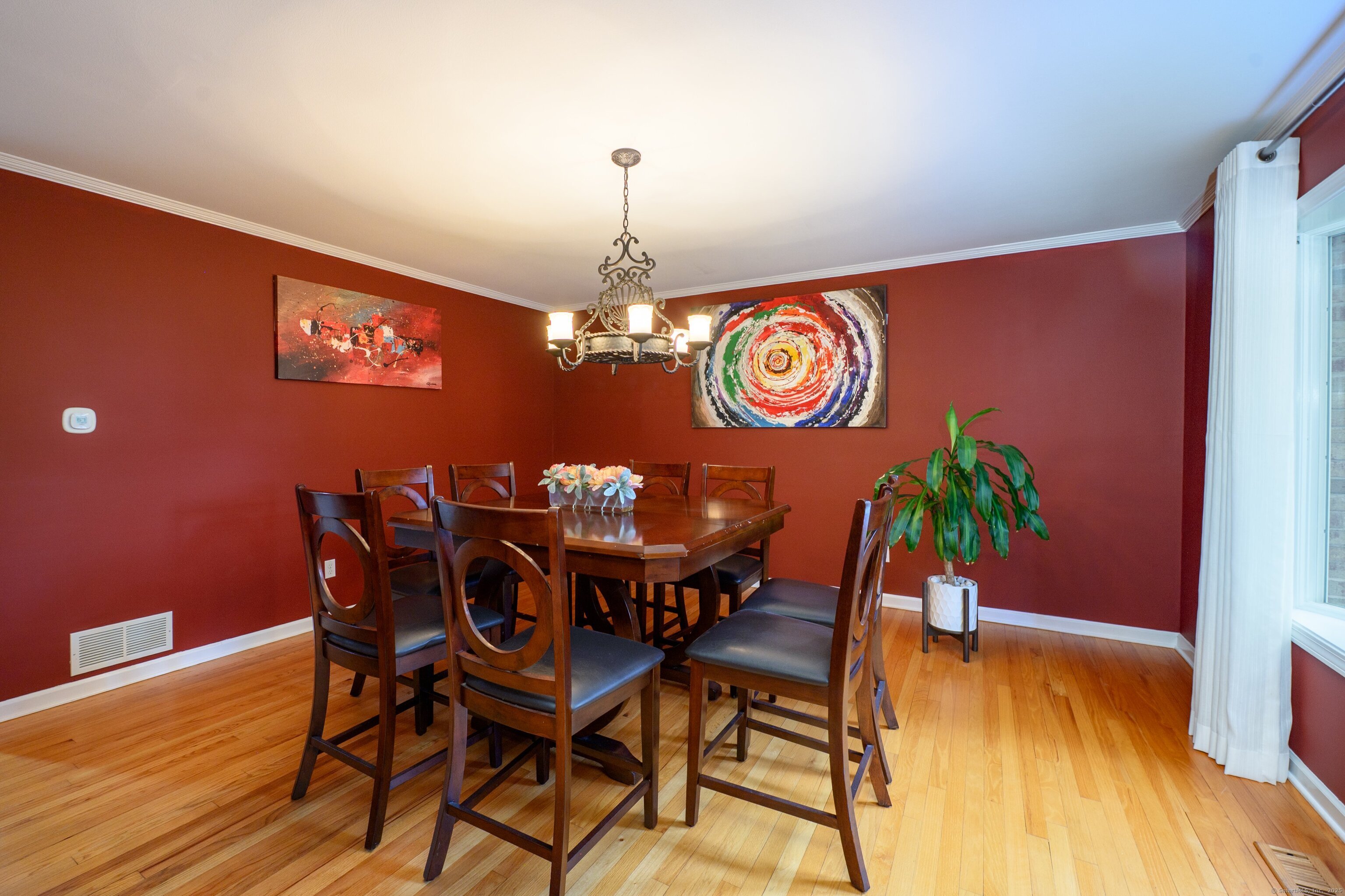85 Inverness Court Cheshire, CT 06410 - Photo 3 of 40 a view of a dining room with furniture and wooden floor