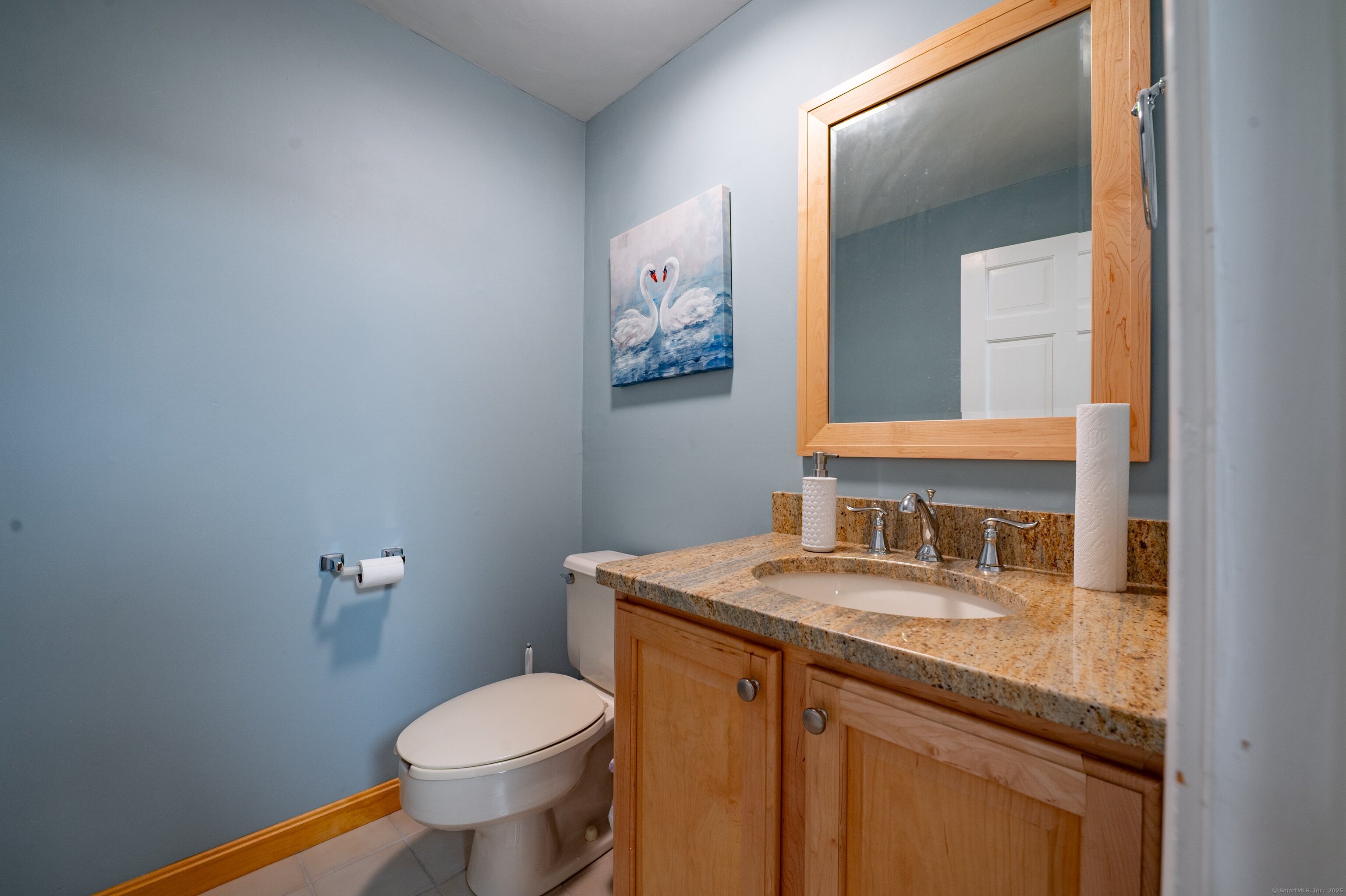 85 Inverness Court Cheshire, CT 06410 - Photo 35 of 40 a bathroom with a granite countertop toilet sink and mirror