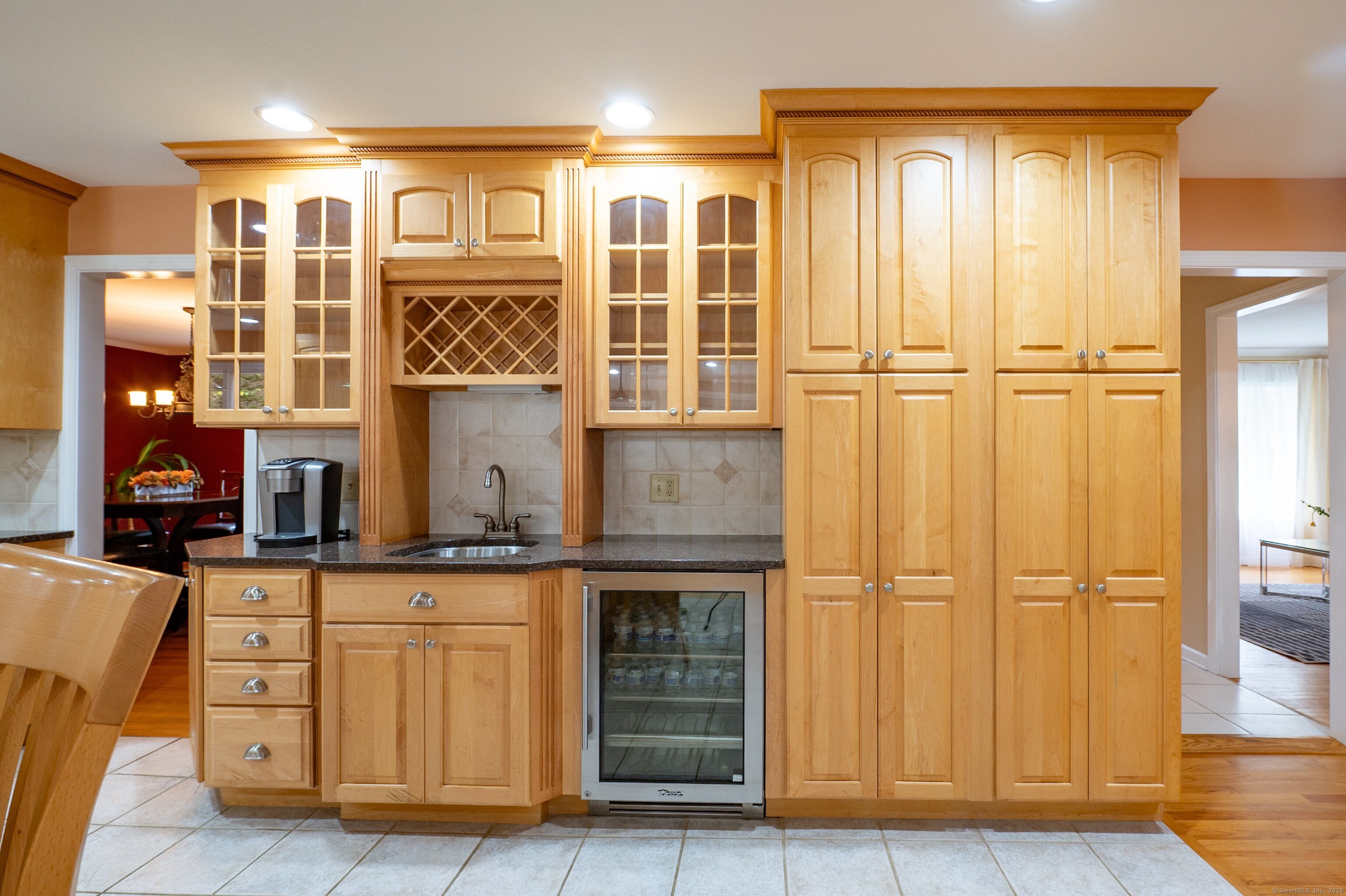 85 Inverness Court Cheshire, CT 06410 - Photo 9 of 40 a kitchen with a refrigerator and cabinets