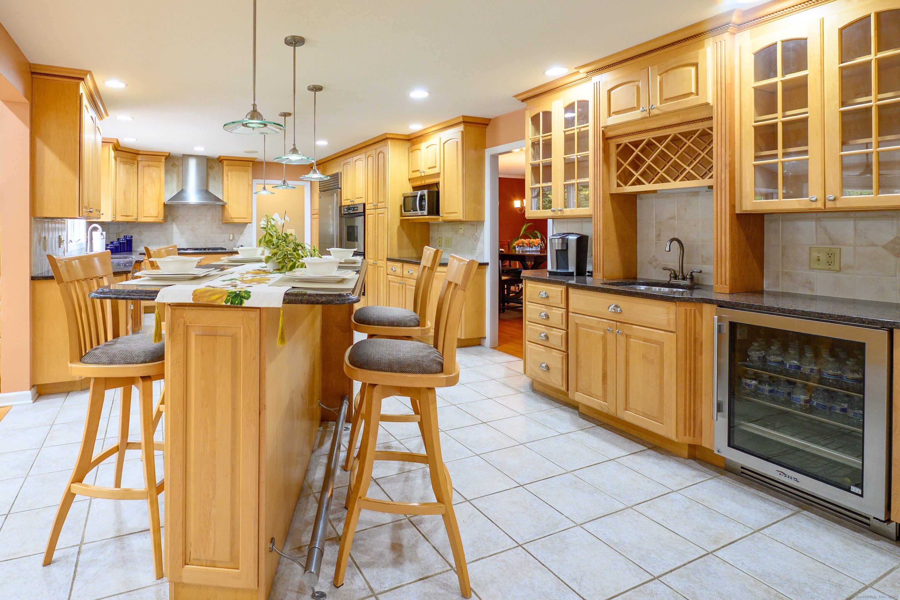 85 Inverness Court Cheshire, CT 06410 - Photo 10 of 40 a open kitchen with stainless steel appliances granite countertop a stove and cabinets