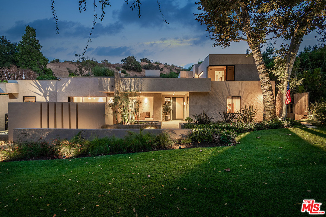 12322 Viewcrest Road Studio City, CA 91604 - Photo 2 of 23 a view of a house with a yard and a patio