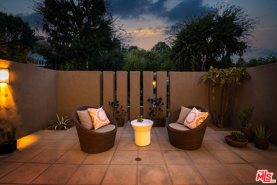 12322 Viewcrest Road Studio City, CA 91604 - Photo 12 of 23 a view of a terrace with furniture