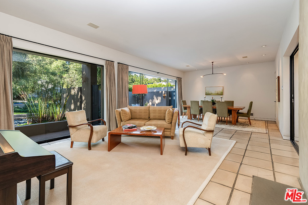 12322 Viewcrest Road Studio City, CA 91604 - Photo 17 of 23 a living room with furniture and a large window