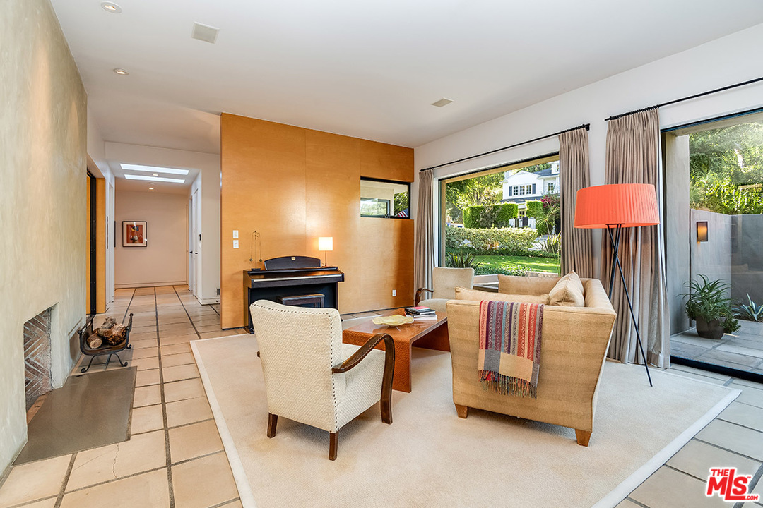 12322 Viewcrest Road Studio City, CA 91604 - Photo 18 of 23 a living room with furniture and a large window