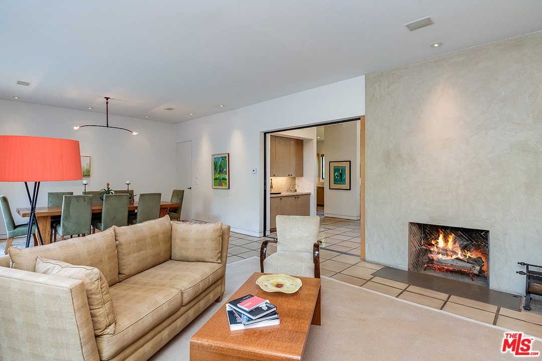 12322 Viewcrest Road Studio City, CA 91604 - Photo 20 of 23 a living room with furniture and a flat screen tv