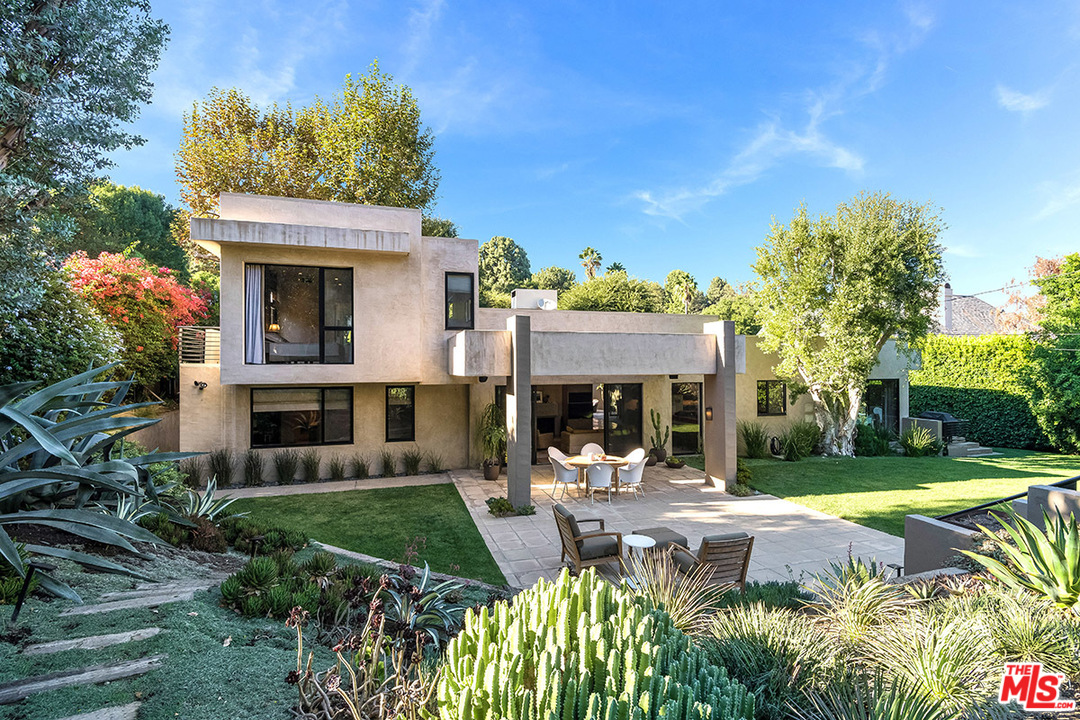 12322 Viewcrest Road Studio City, CA 91604 - Photo 22 of 23 a front view of a house with garden and patio