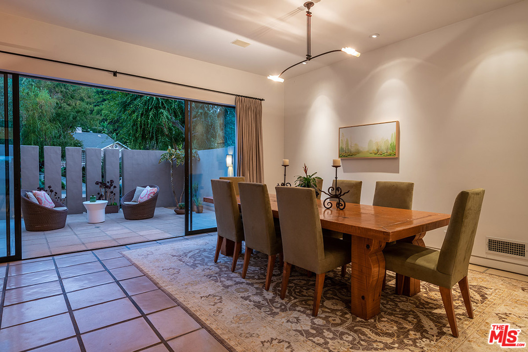 12322 Viewcrest Road Studio City, CA 91604 - Photo 4 of 23 a view of a dining room with furniture window and outside view
