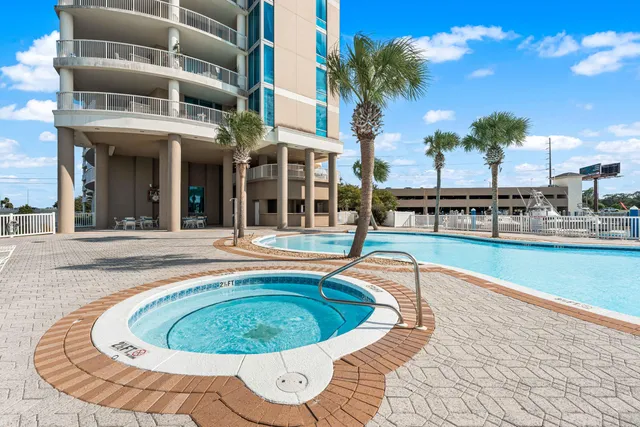 a view of a swimming pool with a house