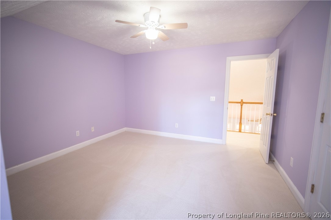 6826 Surrey Road Fayetteville, NC 28306 - Photo 36 of 50 a view of an empty room with a window