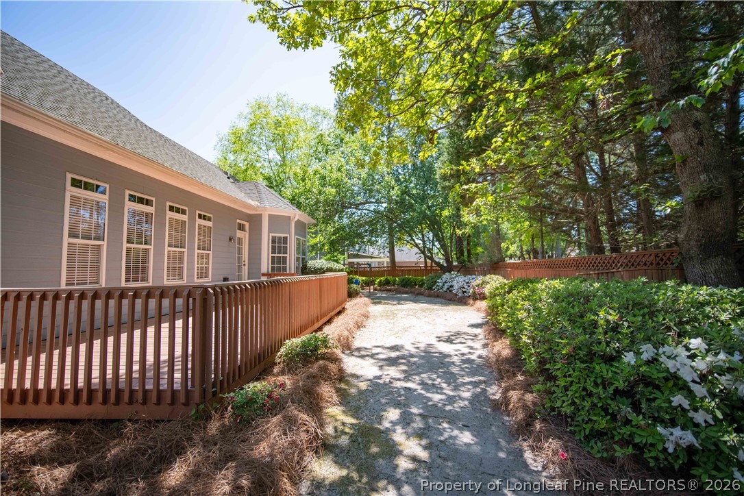 6826 Surrey Road Fayetteville, NC 28306 - Photo 45 of 50 a view of a house with a yard