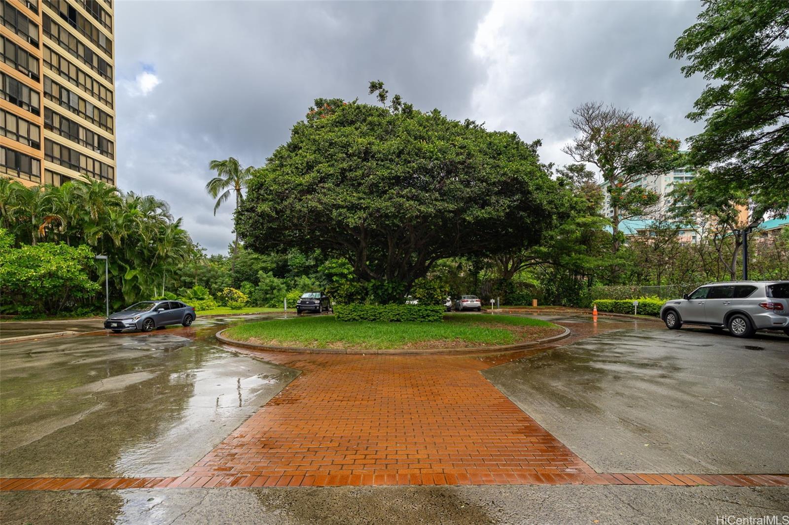5333 Likini Street, Unit 703 Honolulu, HI 96818 - Photo 11 of 19 a view of a street with a parked cars
