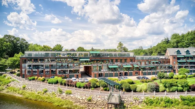 a view of a lake with a building in the background