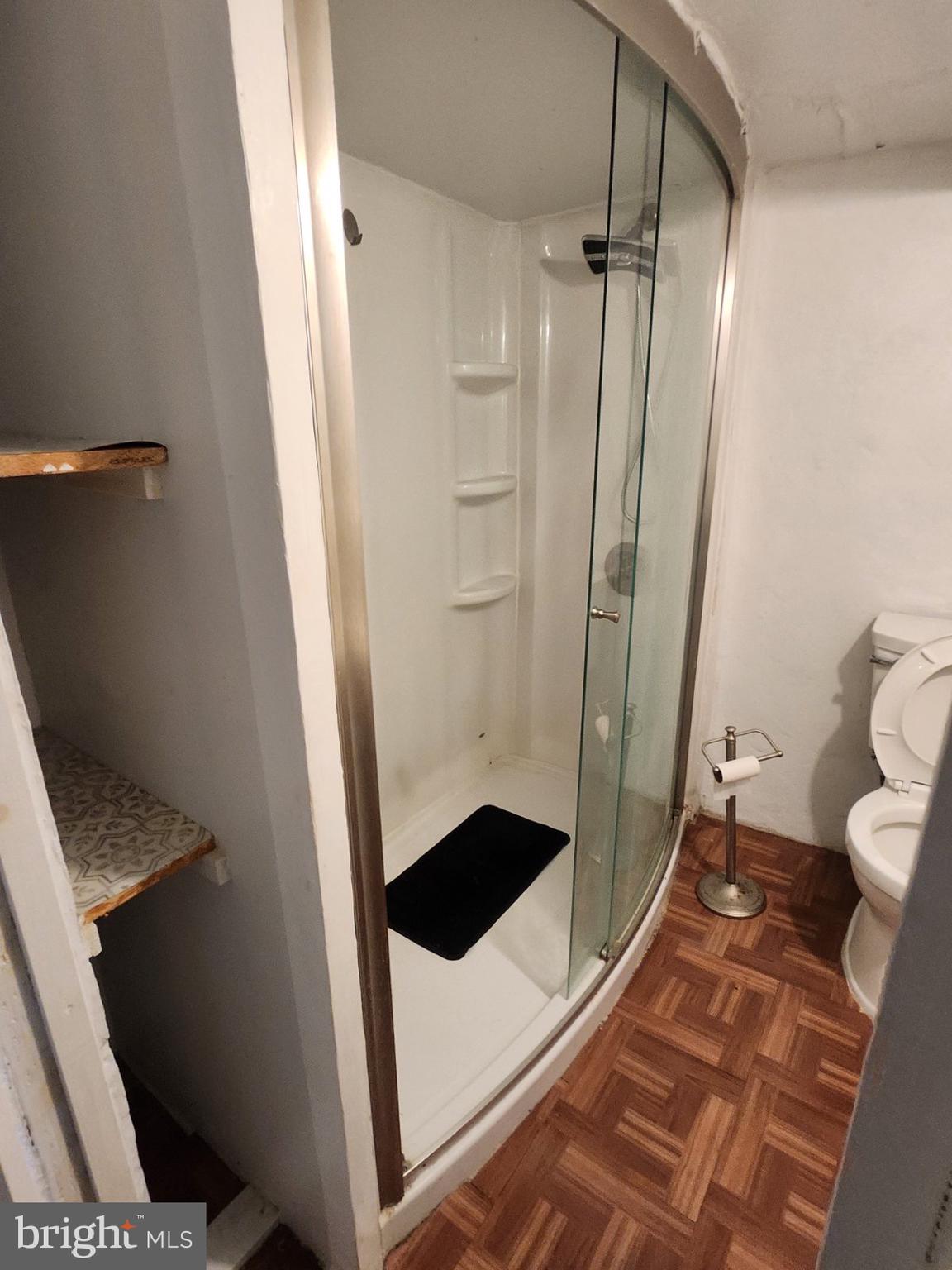 69 South 7th Street Darby, PA 19023 - Photo 5 of 17 a bathroom with a tub and a shower