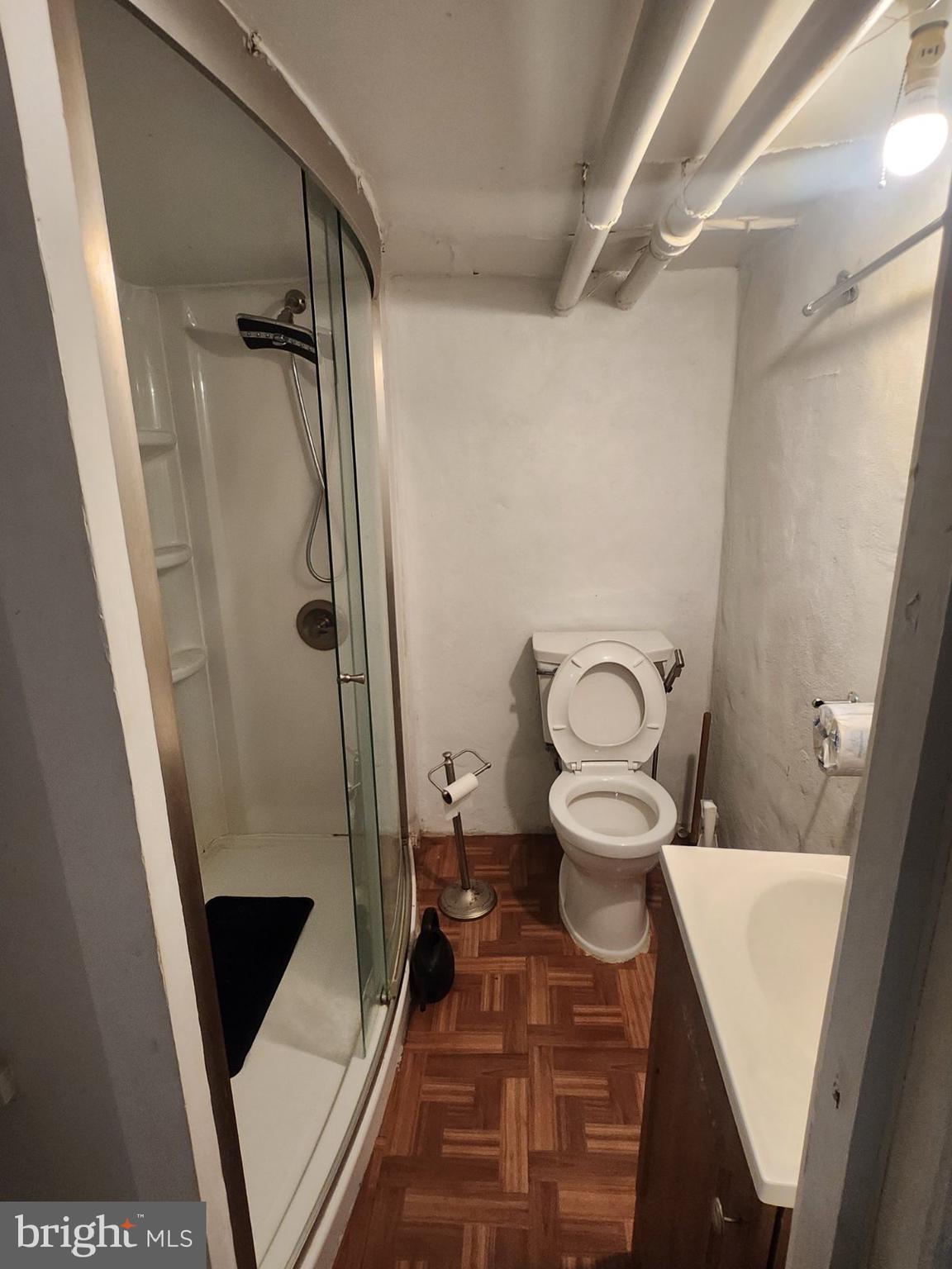 69 South 7th Street Darby, PA 19023 - Photo 6 of 17 a bathroom with a toilet and a shower