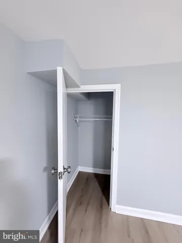 a view of livingroom with hardwood floor and window