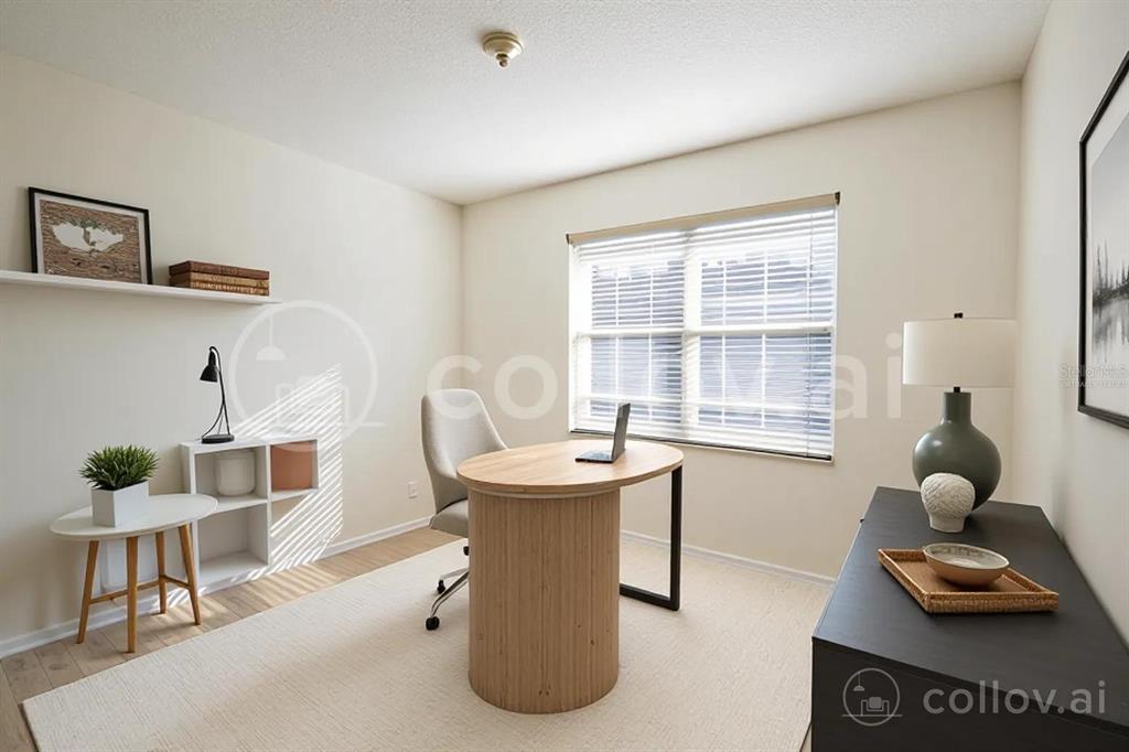 107 Raintree Circle Palm Coast, FL 32164 - Photo 16 of 46 a living room with furniture and a window