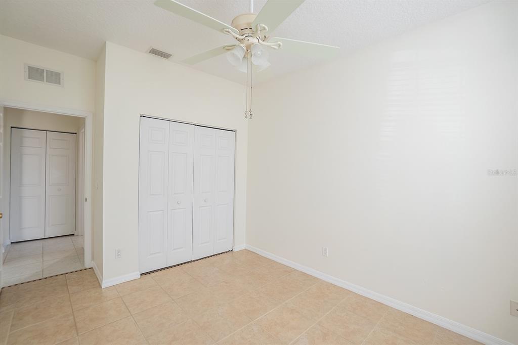 107 Raintree Circle Palm Coast, FL 32164 - Photo 18 of 46 a view of an empty room