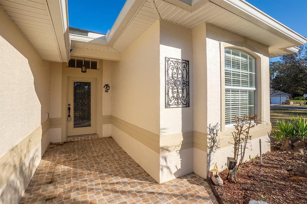 107 Raintree Circle Palm Coast, FL 32164 - Photo 2 of 46 a view of entryway of the house
