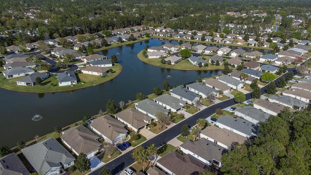 107 Raintree Circle Palm Coast, FL 32164 - Photo 22 of 46 an aerial view of a house with a table and chairs