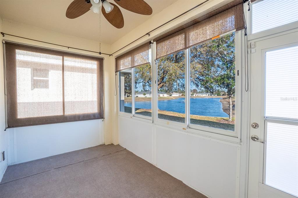 107 Raintree Circle Palm Coast, FL 32164 - Photo 29 of 46 a view of an empty room with a window