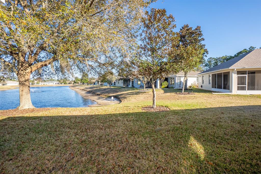 107 Raintree Circle Palm Coast, FL 32164 - Photo 3 of 46 a view of swimming pool with an outdoor space
