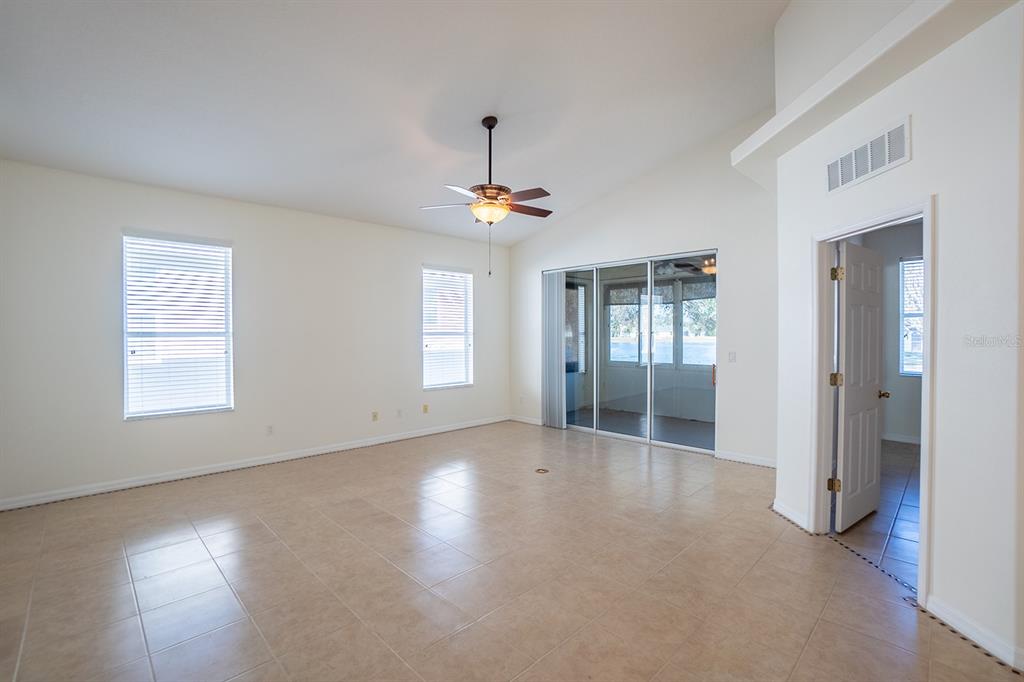 107 Raintree Circle Palm Coast, FL 32164 - Photo 32 of 46 an empty room with windows and closet