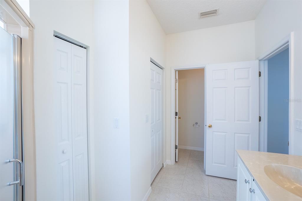 107 Raintree Circle Palm Coast, FL 32164 - Photo 33 of 46 a bathroom with a sink and a tub