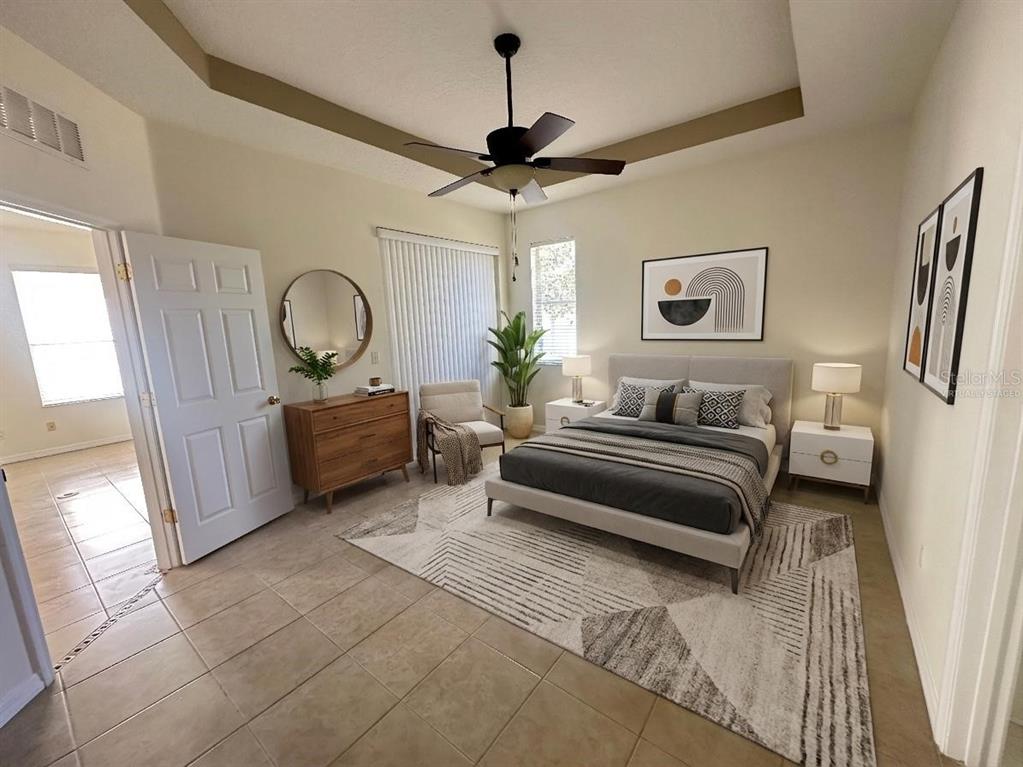 107 Raintree Circle Palm Coast, FL 32164 - Photo 35 of 46 a living room with furniture a window and a chandelier