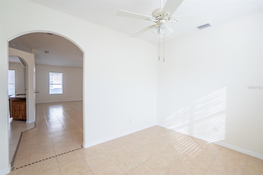 107 Raintree Circle Palm Coast, FL 32164 - Photo 41 of 46 a view of a hallway with a white walls