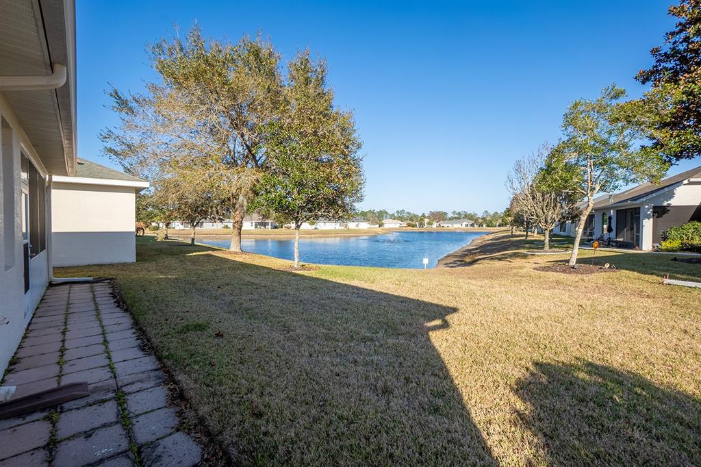 107 Raintree Circle Palm Coast, FL 32164 - Photo 5 of 46 a view of a house with yard