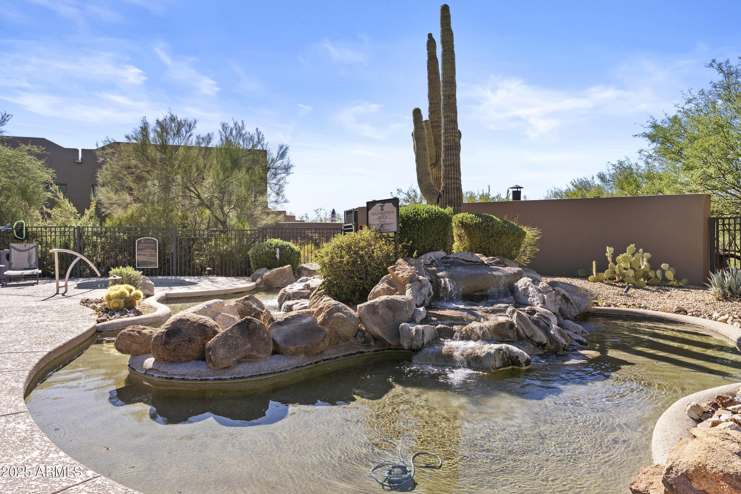 36601 North Mule Train Road, Unit D18 Carefree, AZ 85377 - Photo 49 of 53 a view of a ocean with couches and sky view