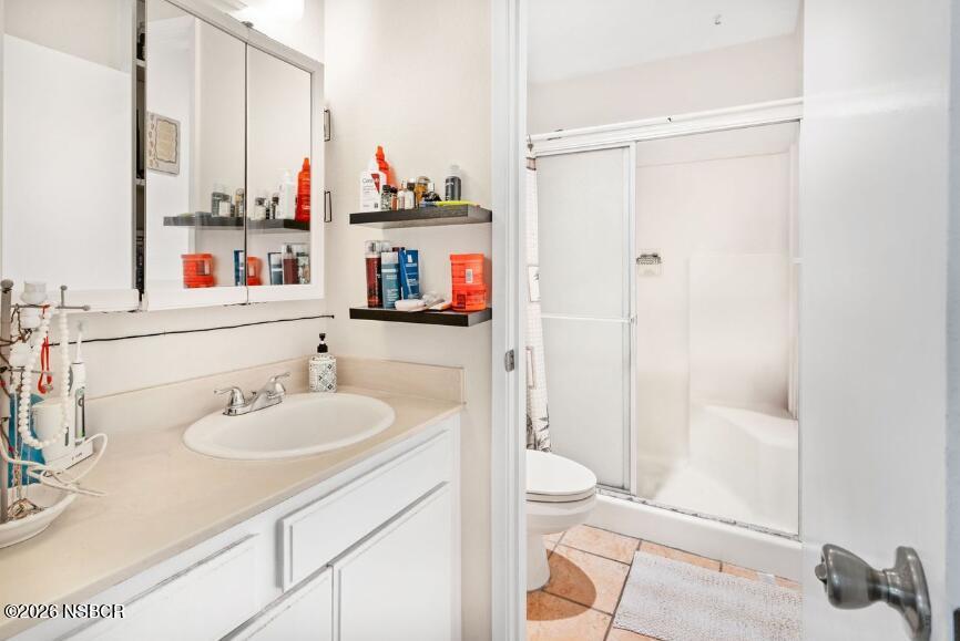 923 North N Place Lompoc, CA 93436 - Photo 12 of 18 a bathroom with a sink toilet and shower
