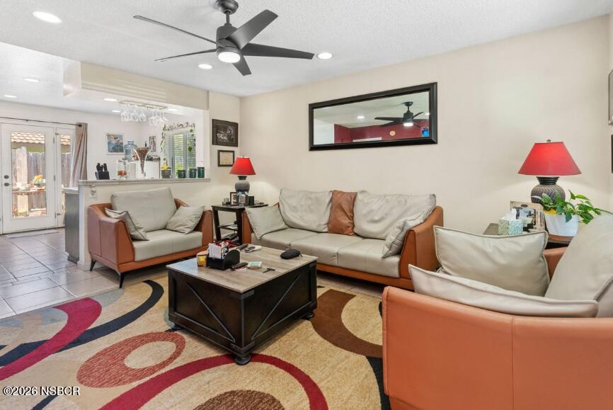 923 North N Place Lompoc, CA 93436 - Photo 5 of 18 a living room with furniture and a chandelier