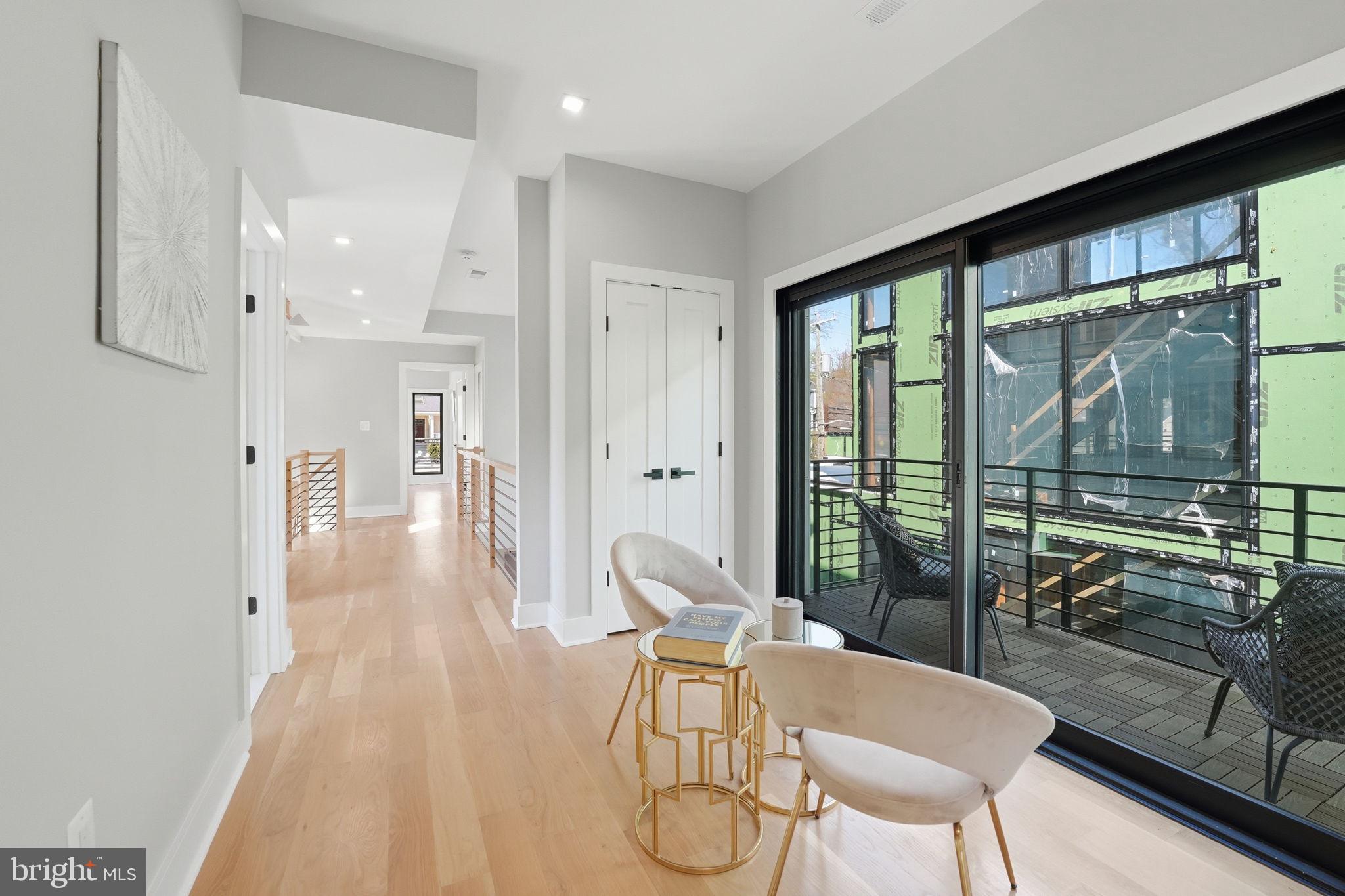 2211 Military Road Arlington, VA 22207 - Photo 37 of 107 Bright, modern hallway with outdoor views.