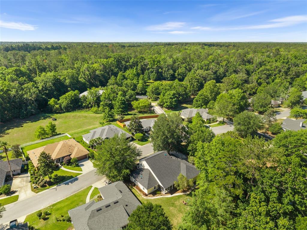 7418 White Oaks Road Alachua, FL 32615 - Photo 38 of 46 an aerial view of a house with a yard