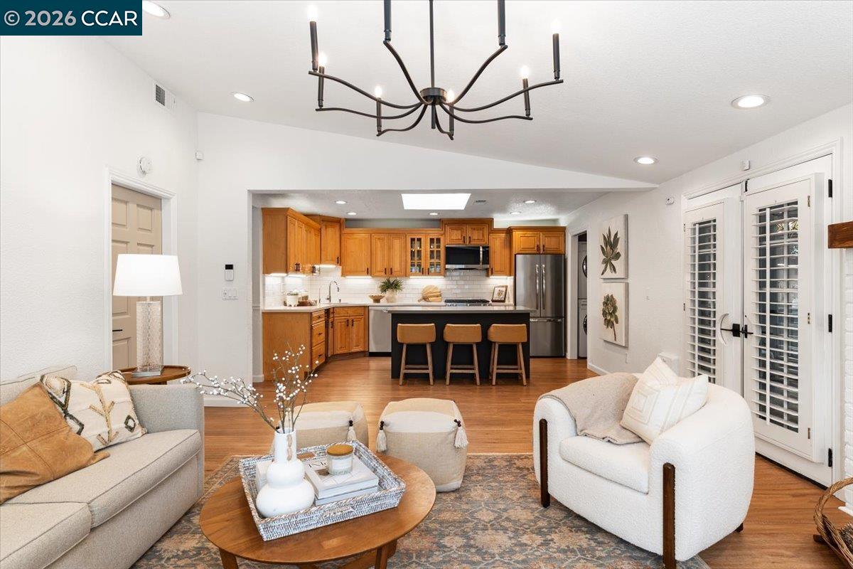 4175 Pickwick Drive Concord, CA 94521 - Photo 21 of 41 a living room with furniture and a large window