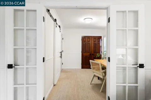 a view of room with furniture and a window