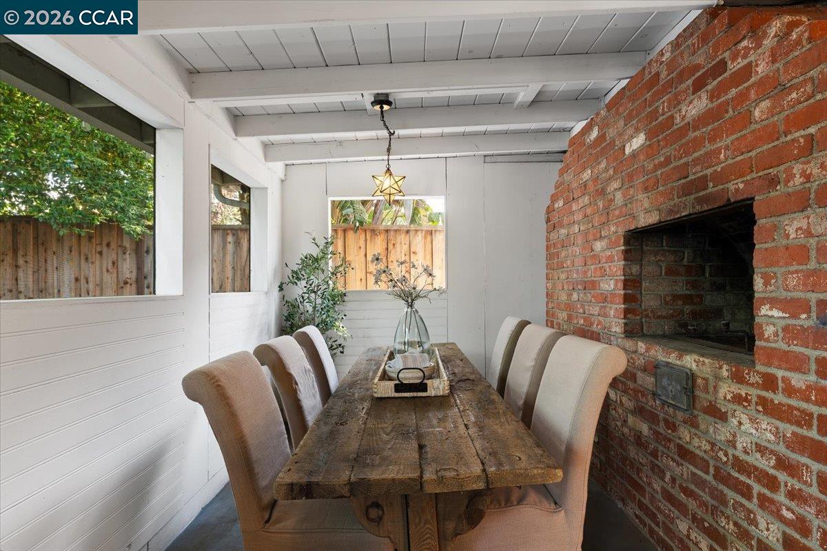 4175 Pickwick Drive Concord, CA 94521 - Photo 33 of 41 a view of a dining room with furniture window and outside view
