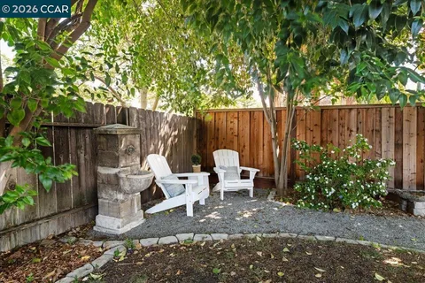 a garden view with a seating space
