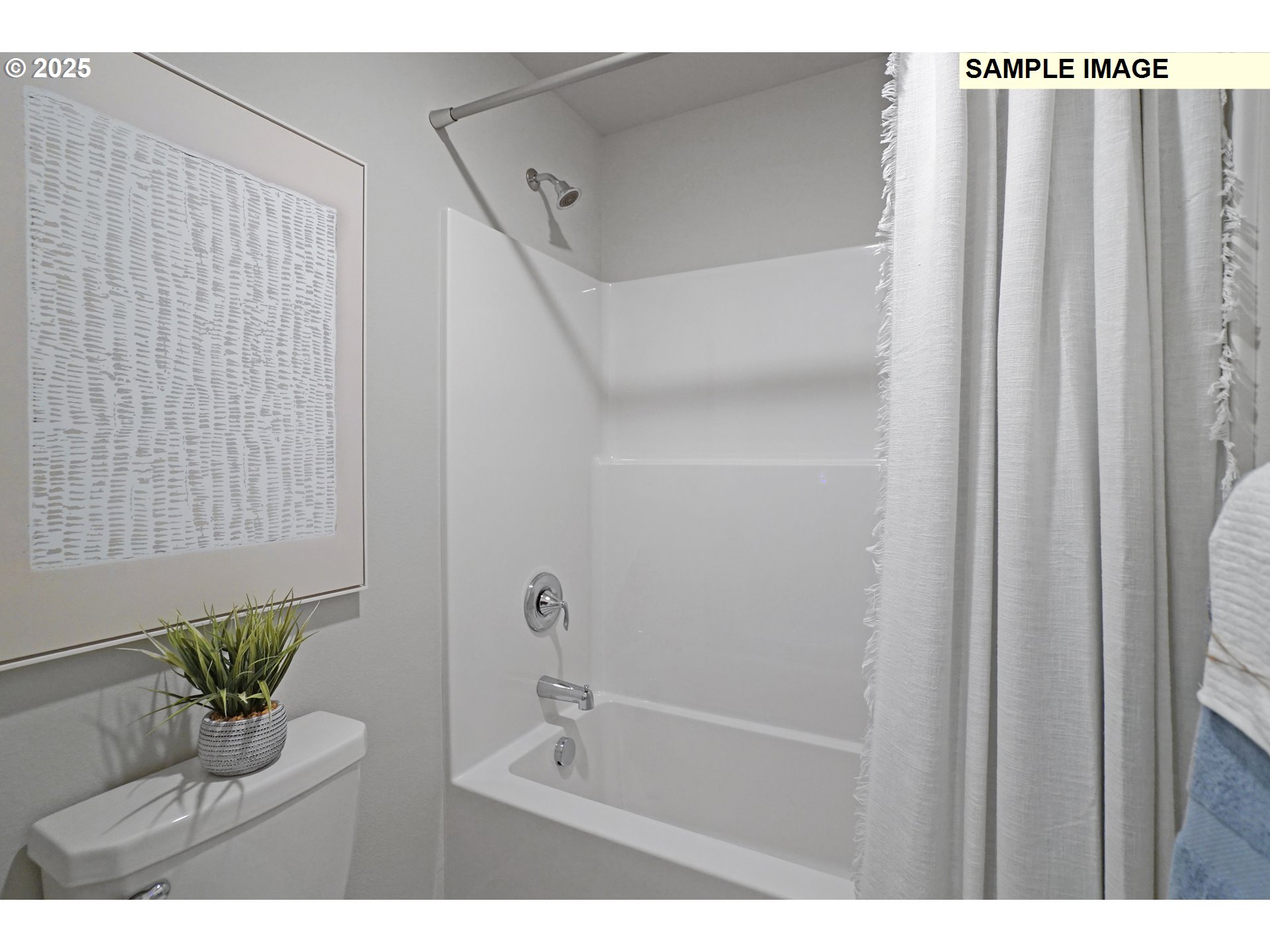 33375 Southwest Rokin Way Scappoose, OR 97056 - Photo 16 of 32 a bathroom with a bathtub and shower