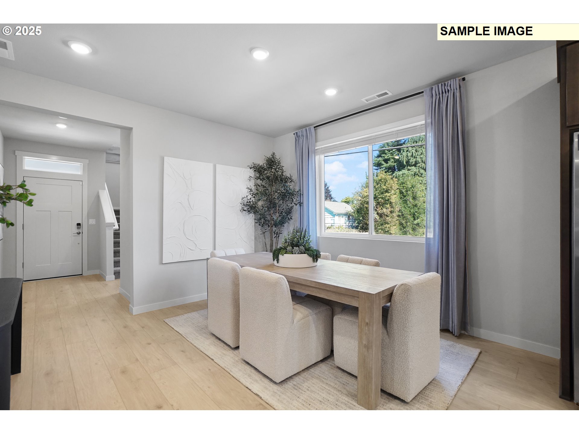 33375 Southwest Rokin Way Scappoose, OR 97056 - Photo 4 of 32 a dining room with furniture and a large window