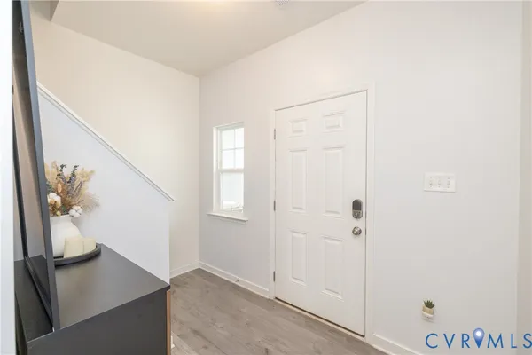 a view of a hallway with front door