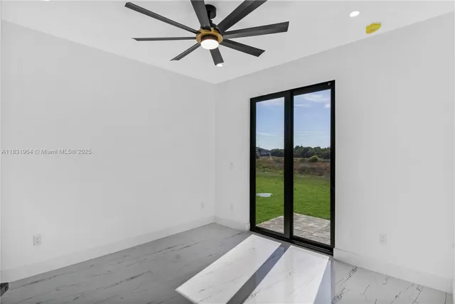 an empty room with fan