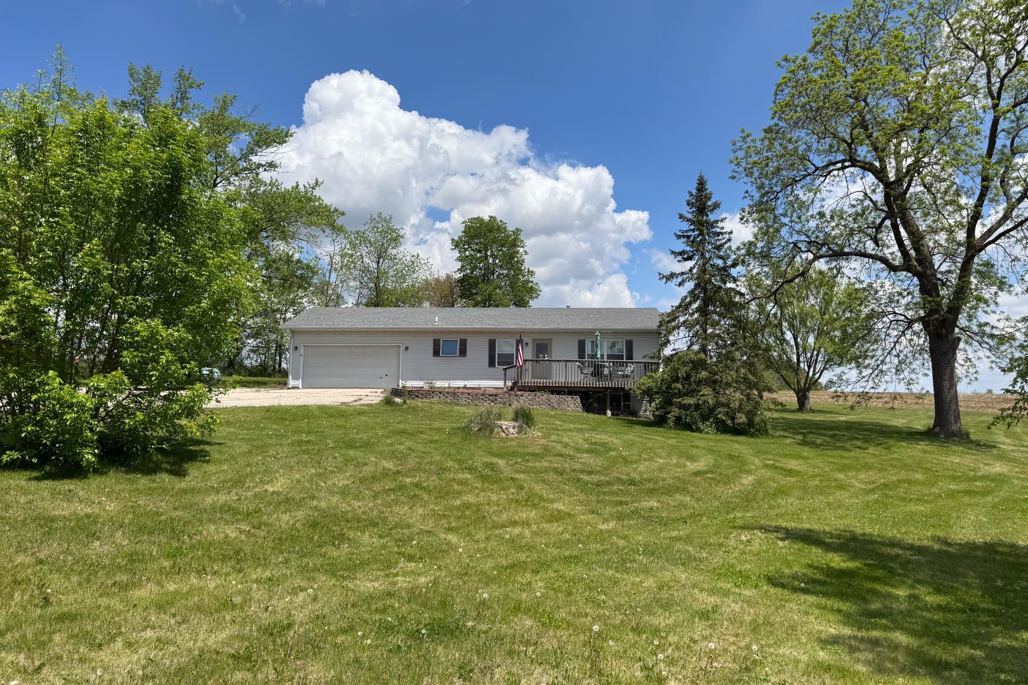 15767 Crowley Road Durand, IL 61024 - Photo 1 of 18 a view of a house with a big yard
