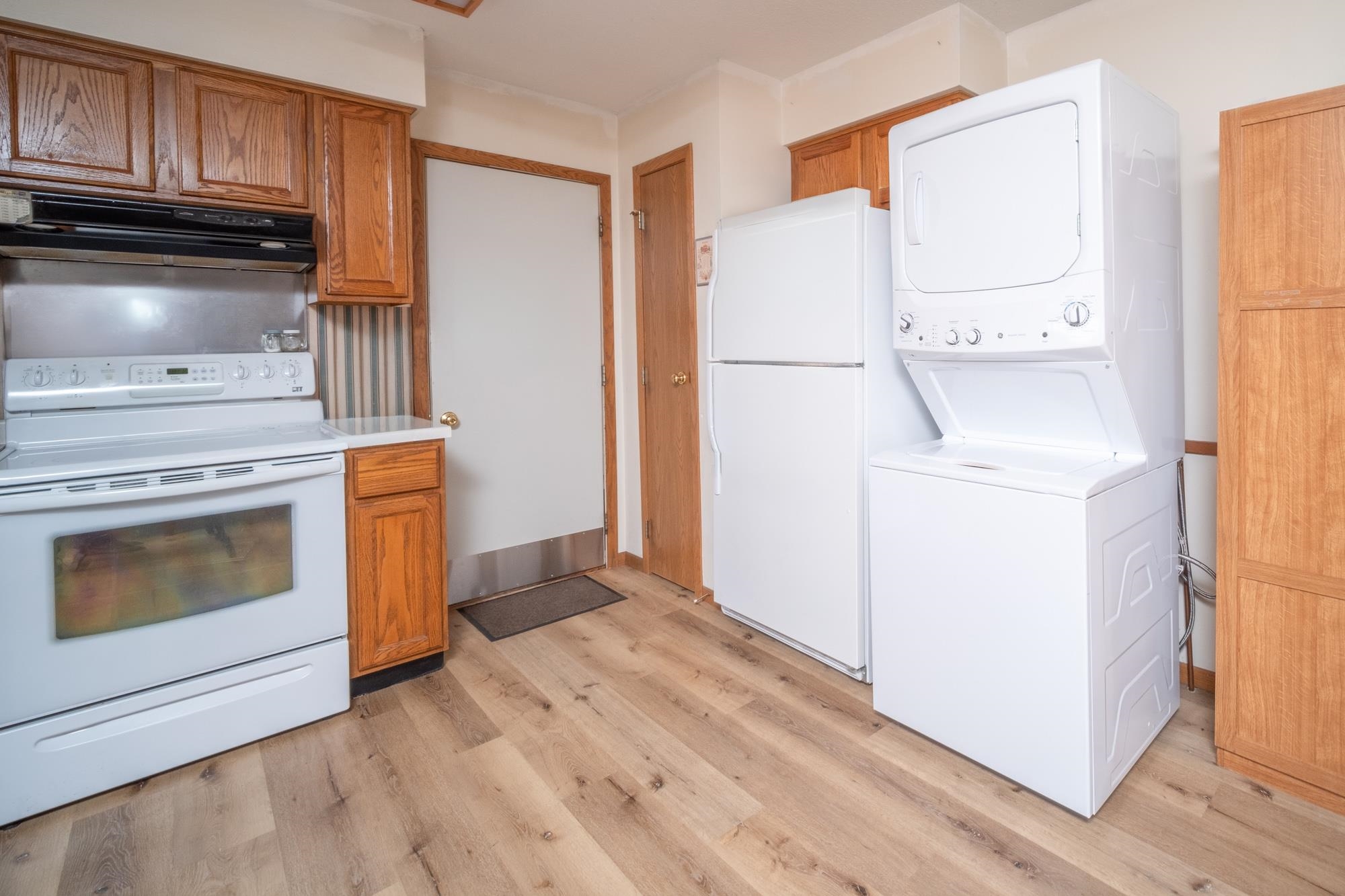 15767 Crowley Road Durand, IL 61024 - Photo 11 of 18 a kitchen with a refrigerator sink stove and cabinets
